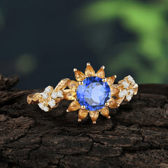 Nature-Inspired Sunflower 4-Prong Round Cut Sapphire Engagement Ring