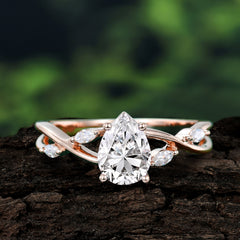 Lux Minimalist 4-Prong Pear-Cut Moissanite Engagement Ring