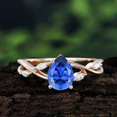 Lux Minimalist 4-Prong Pear-Cut Sapphire Engagement Ring