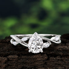 Lux Minimalist 4-Prong Pear-Cut Moissanite Engagement Ring