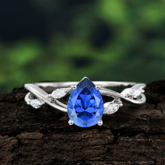 Lux Minimalist 4-Prong Pear-Cut Sapphire Engagement Ring