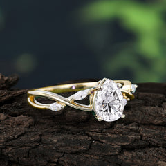 Lux Minimalist 4-Prong Pear-Cut Moissanite Engagement Ring