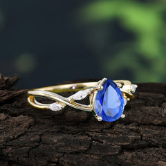 Lux Minimalist 4-Prong Pear-Cut Sapphire Engagement Ring
