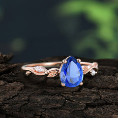 Nature-Inspired Classic 4-Prong Pear-Cut Sapphire Engagement Ring