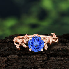 Nature-Inspired Classic 4-Prong Round Sapphire Engagement Ring