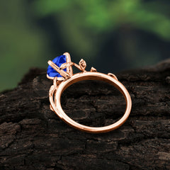 Nature-Inspired Classic 4-Prong Round Sapphire Engagement Ring