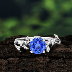 Nature-Inspired Classic 4-Prong Round Sapphire Engagement Ring