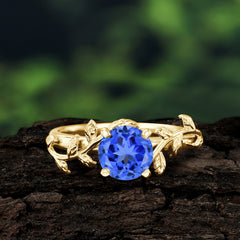 Nature-Inspired Classic 4-Prong Round Sapphire Engagement Ring