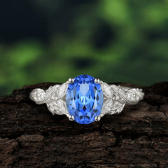 Luxury Vintage Haute Nature 4-Prong Oval Sapphire Ring