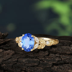 Luxury Vintage Haute Nature 4-Prong Oval Sapphire Ring