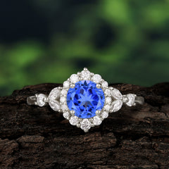 Luxury 4-Prong Round Cut Sapphire Engagement Ring