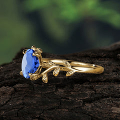 Nature Inspired 4 Prong Oval Cut Sapphire Wedding Ring