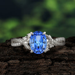 Nature Inspired 4 Prong Golden Vine Oval Cut Sapphire Ring