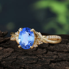 Nature Inspired 4 Prong Golden Vine Oval Cut Sapphire Ring