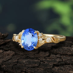 Retro Nature-Inspired 4-Prong Oval-Cut Sapphire Engagement Ring