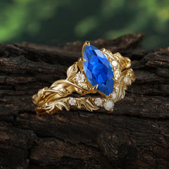 Nature-Inspired 6 Prong Marquise Sapphire Engagement Ring Set with Vine Motif
