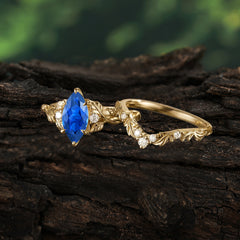 Nature-Inspired 6 Prong Marquise Sapphire Engagement Ring Set with Vine Motif