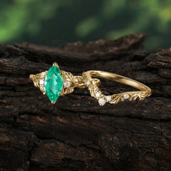 Nature-Inspired Marquise Emerald Engagement Ring Set with Vine Motif