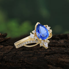 Fashion-Forward 3 Prong Luxury Pear-Cut Sapphire Engagement Ring Set