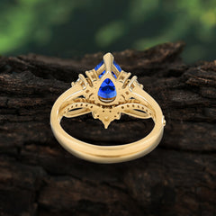 Fashion-Forward 3 Prong Luxury Pear-Cut Sapphire Engagement Ring Set