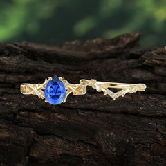 Nature-Inspired 4 Prong Pear-Cut Sapphire Ring Set