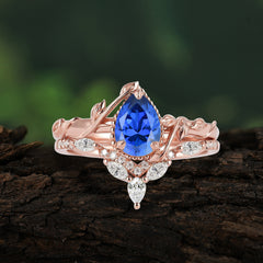 Nature-Inspired 3-Prong Oval-Cut Sapphire Engagement Ring Set with Vine Accents