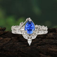 Nature-Inspired 3-Prong Oval-Cut Sapphire Engagement Ring Set with Vine Accents
