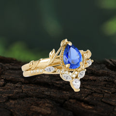 Nature-Inspired 3-Prong Oval-Cut Sapphire Engagement Ring Set with Vine Accents