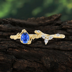 Nature-Inspired 3-Prong Oval-Cut Sapphire Engagement Ring Set with Vine Accents