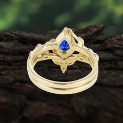 Nature-Inspired 3-Prong Oval-Cut Sapphire Engagement Ring Set with Vine Accents