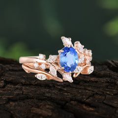 Romantic Nature-inspired 4-Prong Oval Cut Sapphire Stacking Ring