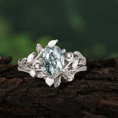 1.15 CT Delicate Leaf Accented 4 Prong Oval Shaped Natural Moss Agate Ring Sets