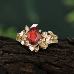 1.15 CT Delicate Leaf Accented 4 Prong Oval Shaped Garnet Ring Sets