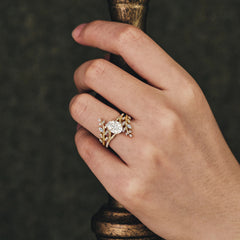 Delicate Leaf Embellished 4 - Prong Oval - Cut Moissanite Ring Sets