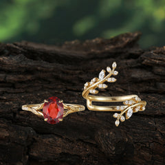 Delicate Leaf Embellished 4 - Prong Oval - Cut Garnet Ring Sets