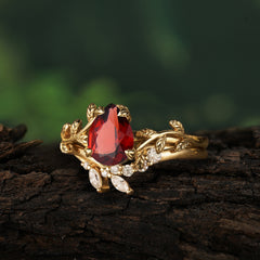 Nature  Inspired 4  Prong Pear  Cut Garnet Wedding Ring Sets