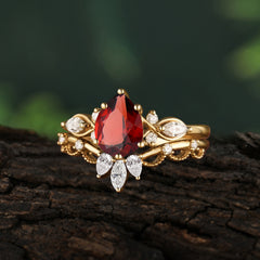 6 Prong Romantic Vine Themed Pear Cut Garnet Rings