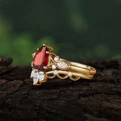 6 Prong Romantic Vine Themed Pear Cut Garnet Rings