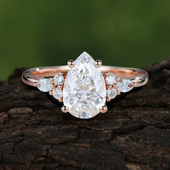 Sophisticated 4-Prong Pear-Cut Moissanite Promise Ring