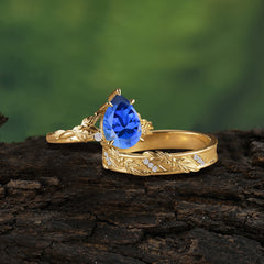 Elegant & Luxurious 3 prong Pear-Cut Sapphire Wedding Band Set