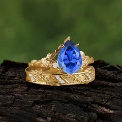 Elegant & Luxurious 3 prong Pear-Cut Sapphire Wedding Band Set