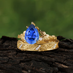 Elegant & Luxurious 3 prong Pear-Cut Sapphire Wedding Band Set