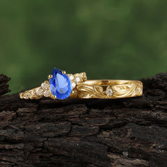 Nature-Inspired Vintage 4-Prong Pear Cut Sapphire Bridal Set