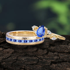 Exquisite 4-Prong Pear Cut Sapphire Engagement Ring Set