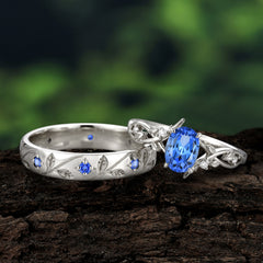 Nature-Inspired Branch-Wrapped 4-Prong Oval Sapphire Engagement Couple Rings